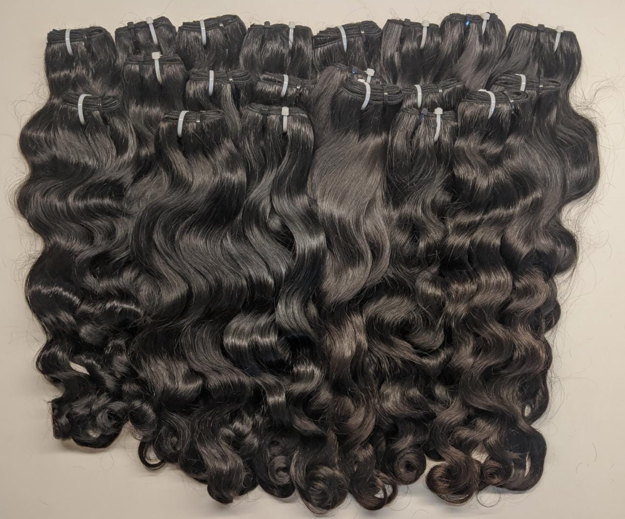 Natural color Straight/ Wavy (raw Indian Hair)