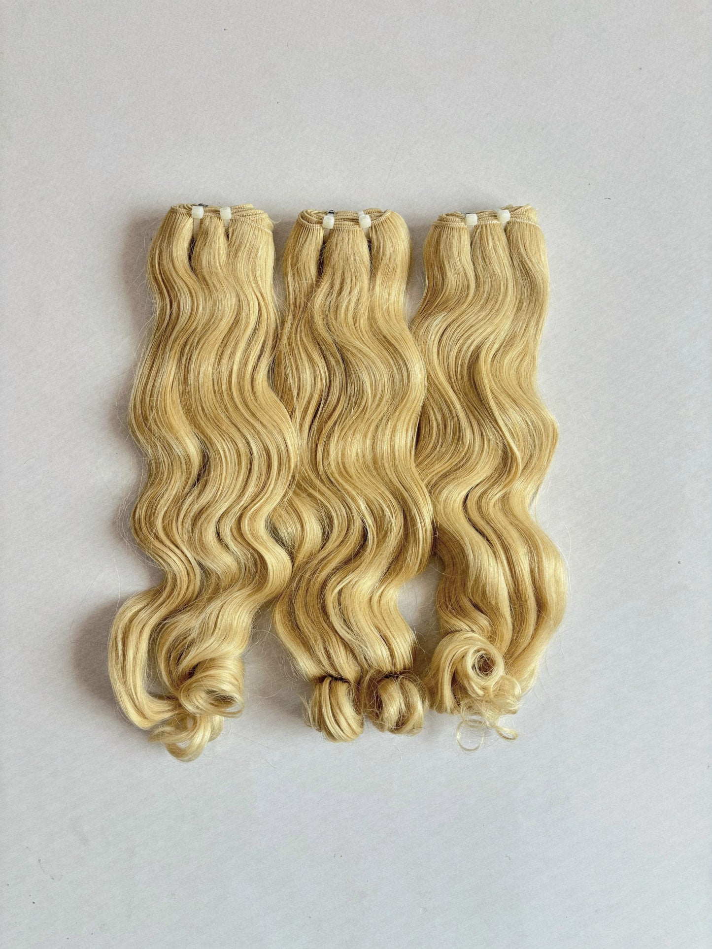 Blonde wavy (Raw Indian Hair)